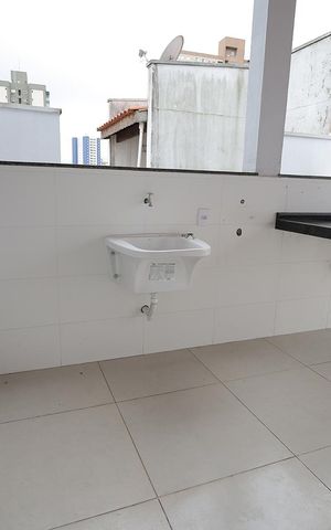 Apartamento à venda com 100m², 2 quartos e 2 vagas Apartamento à venda com 100m², 2 quartos e 2 vagasCozinha e Área de Serviço