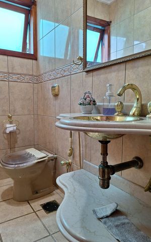 Casa à venda com 498m², 5 quartos e 3 vagasLavabo 1