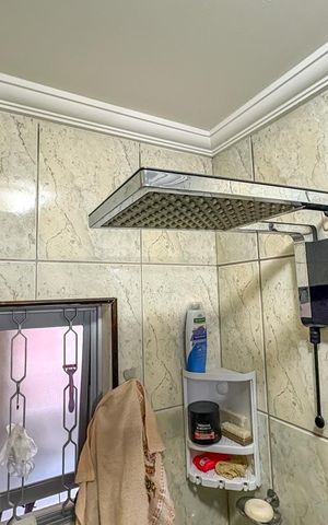 Casa à venda com 266m², 3 quartos e 2 vagas Casa à venda com 266m², 3 quartos e 2 vagasBanheiro da Suíte 1