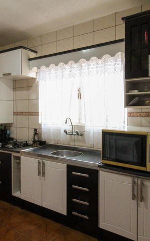 Casa à venda com 200m², 3 quartos e 3 vagas Casa à venda com 200m², 3 quartos e 3 vagasCozinha
