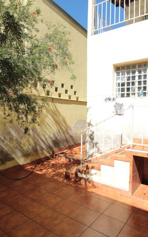 Casa à venda com 447m², 5 quartos e 3 vagasCasa 1 | Quintal