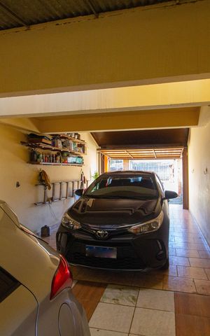 Casa à venda com 243m², 4 quartos e 3 vagas Casa à venda com 243m², 4 quartos e 3 vagasGaragem