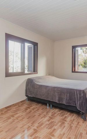 Casa à venda com 290m², 4 quartos e 2 vagasQuarto
