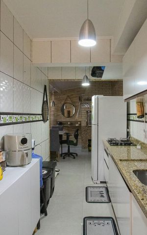 Casa de condomínio à venda com 100m², 3 quartos e 2 vagas Casa de condomínio à venda com 100m², 3 quartos e 2 vagasCozinha