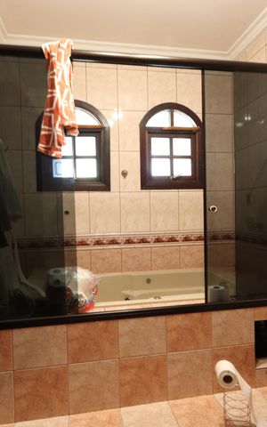 Casa à venda com 446m², 3 quartos e 4 vagasBanheiro da Suíte