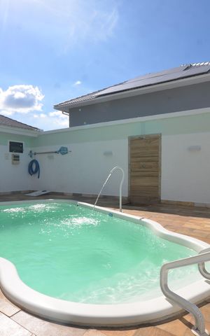 Casa de condomínio à venda com 400m², 3 quartos e 4 vagasPiscina