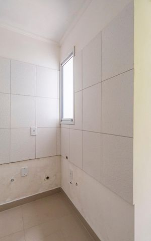 Casa à venda com 46m², 2 quartos e 2 vagas Casa à venda com 46m², 2 quartos e 2 vagasCozinha