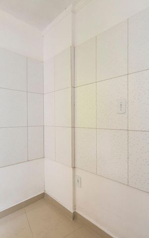 Casa à venda com 46m², 2 quartos e 2 vagas Casa à venda com 46m², 2 quartos e 2 vagasCozinha