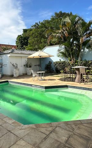 Casa à venda com 508m², 4 quartos e 5 vagas Casa à venda com 508m², 4 quartos e 5 vagasÁrea Externa