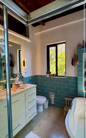 Casa à venda com 246m², 4 quartos e 3 vagasBanheiro da Suíte