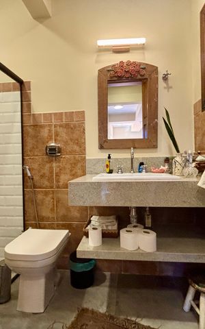 Casa à venda com 246m², 4 quartos e 3 vagasBanheiro 1