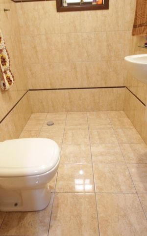 Casa à venda com 172m², 3 quartos e 1 vagaBanheiro 2
