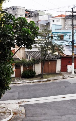 Casa à venda com 140m², 3 quartos e 1 vaga Casa à venda com 140m², 3 quartos e 1 vagaVista da Churrasqueira e Espaço Goumert