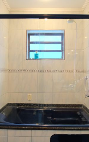 Casa à venda com 300m², 4 quartos e 4 vagasBanheiro da Suíte 2