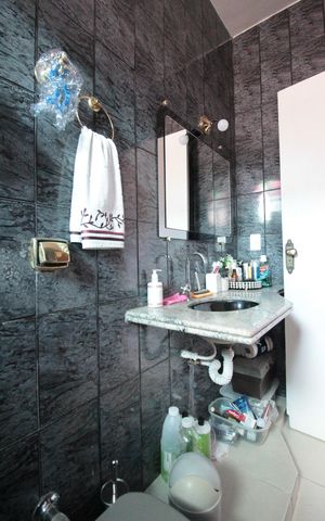 Casa à venda com 411m², 3 quartos e 3 vagasBanheiro da Suite