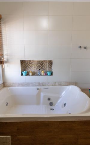 Casa à venda com 138m², 3 quartos e 4 vagas Casa à venda com 138m², 3 quartos e 4 vagasBanheiro da Suíte