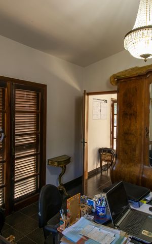 Casa de condomínio para alugar com 900m², 5 quartos e 6 vagasEscritório da suíte 3
