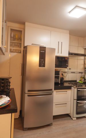 Casa de condomínio à venda com 130m², 3 quartos e 2 vagas Casa de condomínio à venda com 130m², 3 quartos e 2 vagasCozinha e Área de Serviço