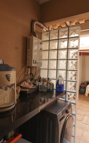 Casa de condomínio à venda com 130m², 3 quartos e 2 vagas Casa de condomínio à venda com 130m², 3 quartos e 2 vagasCozinha e Área de Serviço
