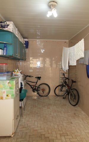Casa à venda com 120m², 4 quartos e 4 vagasCasa 1 - Área de Serviço