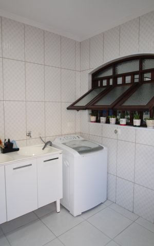 Casa à venda com 120m², 4 quartos e 4 vagasCasa 2 - Área de Serviço