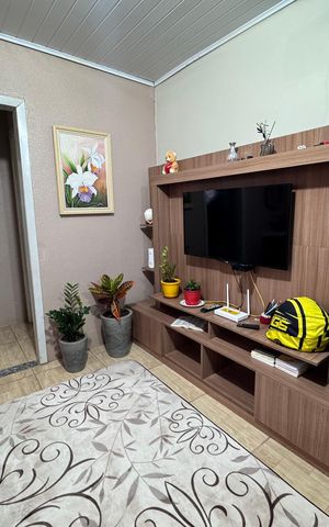 Casa à venda com 160m², 3 quartos e 2 vagas Casa à venda com 160m², 3 quartos e 2 vagasSala