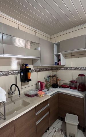 Casa à venda com 160m², 3 quartos e 2 vagas Casa à venda com 160m², 3 quartos e 2 vagasCozinha e Área de Serviço