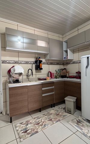 Casa à venda com 160m², 3 quartos e 2 vagas Casa à venda com 160m², 3 quartos e 2 vagasCozinha e Área de Serviço