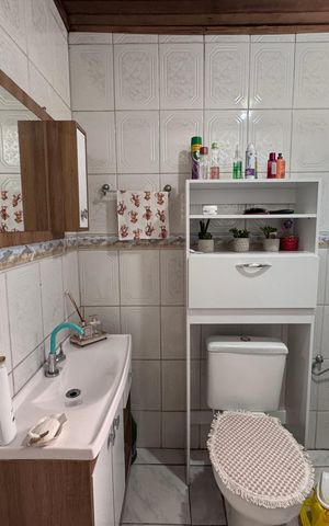 Casa à venda com 160m², 3 quartos e 2 vagas Casa à venda com 160m², 3 quartos e 2 vagasBanheiro