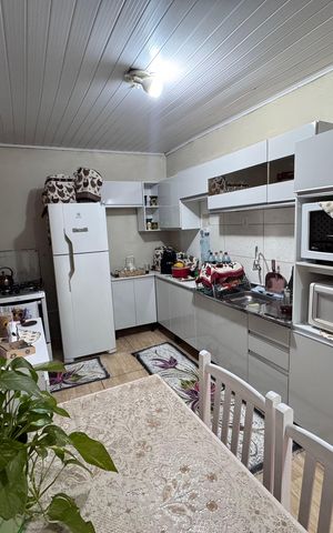 Casa à venda com 160m², 3 quartos e 2 vagas Casa à venda com 160m², 3 quartos e 2 vagasCozinha