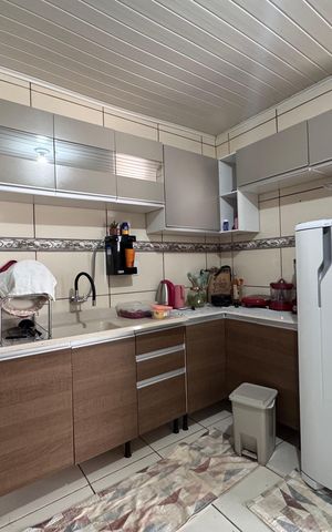 Casa à venda com 160m², 3 quartos e 2 vagas Casa à venda com 160m², 3 quartos e 2 vagasCozinha e Área de Serviço