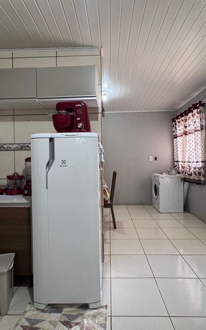 Casa à venda com 160m², 3 quartos e 2 vagas Casa à venda com 160m², 3 quartos e 2 vagasCozinha e Área de Serviço