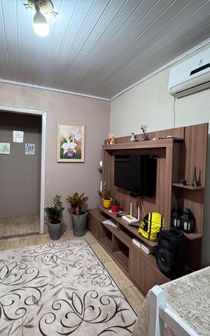 Casa à venda com 160m², 3 quartos e 2 vagas Casa à venda com 160m², 3 quartos e 2 vagasSala