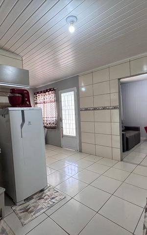 Casa à venda com 160m², 3 quartos e 2 vagas Casa à venda com 160m², 3 quartos e 2 vagasCozinha e Área de Serviço