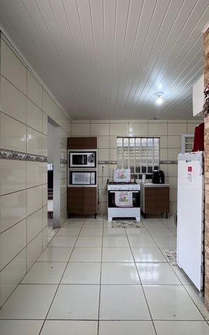 Casa à venda com 160m², 3 quartos e 2 vagas Casa à venda com 160m², 3 quartos e 2 vagasCozinha e Área de Serviço