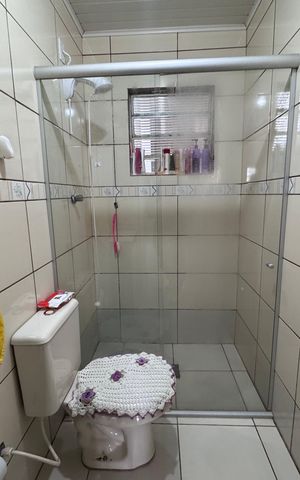 Casa à venda com 160m², 3 quartos e 2 vagas Casa à venda com 160m², 3 quartos e 2 vagasBanheiro Social 1