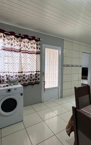 Casa à venda com 160m², 3 quartos e 2 vagas Casa à venda com 160m², 3 quartos e 2 vagasCozinha e Área de Serviço
