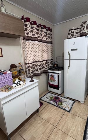 Casa à venda com 160m², 3 quartos e 2 vagas Casa à venda com 160m², 3 quartos e 2 vagasCozinha