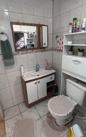 Casa à venda com 160m², 3 quartos e 2 vagas Casa à venda com 160m², 3 quartos e 2 vagasBanheiro Social 2