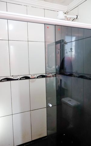 Casa à venda com 130m², 2 quartos e sem vaga Casa à venda com 130m², 2 quartos e sem vagaBanheiro da Suíte 1