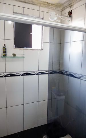 Casa à venda com 130m², 2 quartos e sem vaga Casa à venda com 130m², 2 quartos e sem vagaBanheiro da Suíte 2