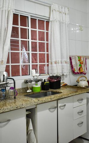Casa à venda com 133m², 3 quartos e 4 vagas Casa à venda com 133m², 3 quartos e 4 vagasCozinha
