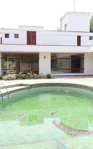 Casa à venda com 945m², 4 quartos e 2 vagasÁrea Externa