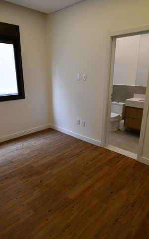 Casa de condomínio à venda com 350m², 3 quartos e 4 vagasSuíte 1