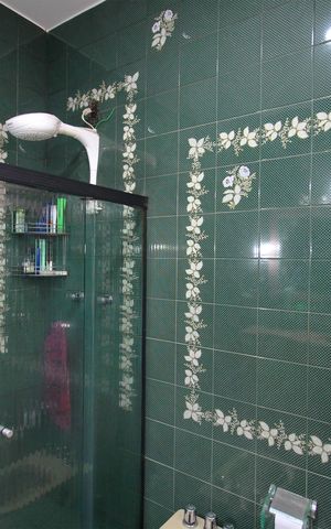 Casa à venda com 420m², 5 quartos e 4 vagasBanheiro da Suíte
