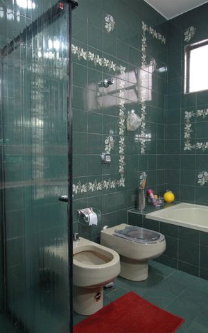 Casa à venda com 420m², 5 quartos e 4 vagasBanheiro da Suíte