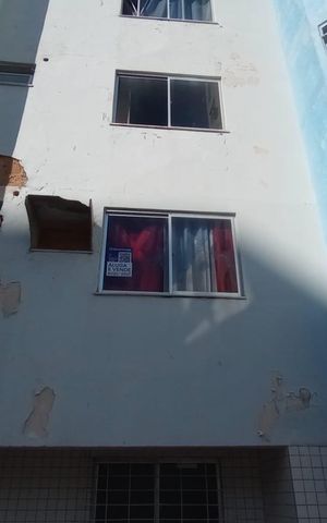 Apartamento à venda com 65m², 2 quartos e 1 vaga Apartamento à venda com 65m², 2 quartos e 1 vagaFachada com Placa