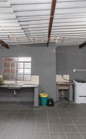 Casa à venda com 295m², 5 quartos e 1 vagaÁrea de Serviço da Casa 01