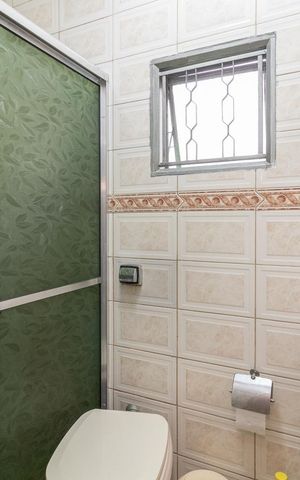 Casa à venda com 295m², 5 quartos e 1 vagaBanheiro da Suíte da Casa 01