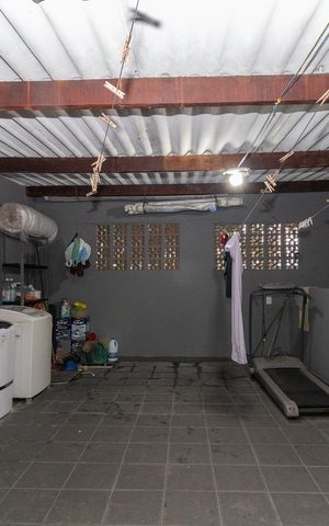 Casa à venda com 295m², 5 quartos e 1 vagaÁrea de Serviço da Casa 01